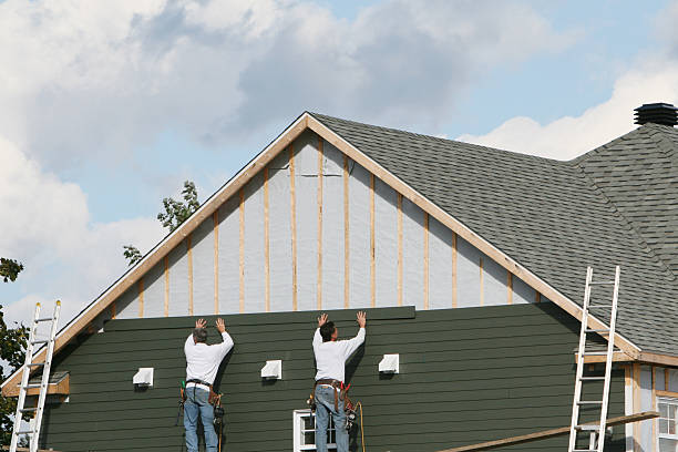 Professional Siding Contractor technician working in Hood, VA